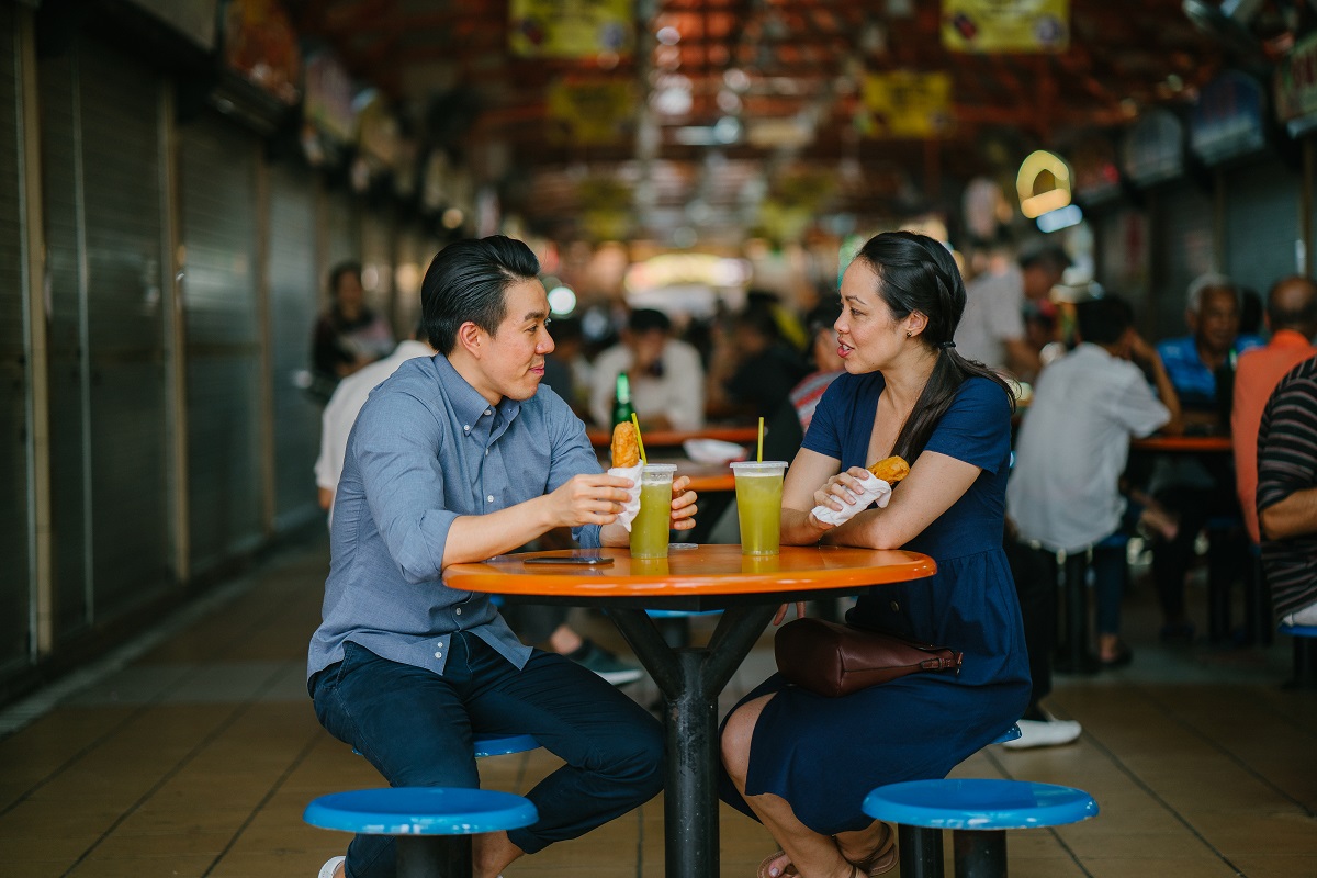 Couple eating at Singapore