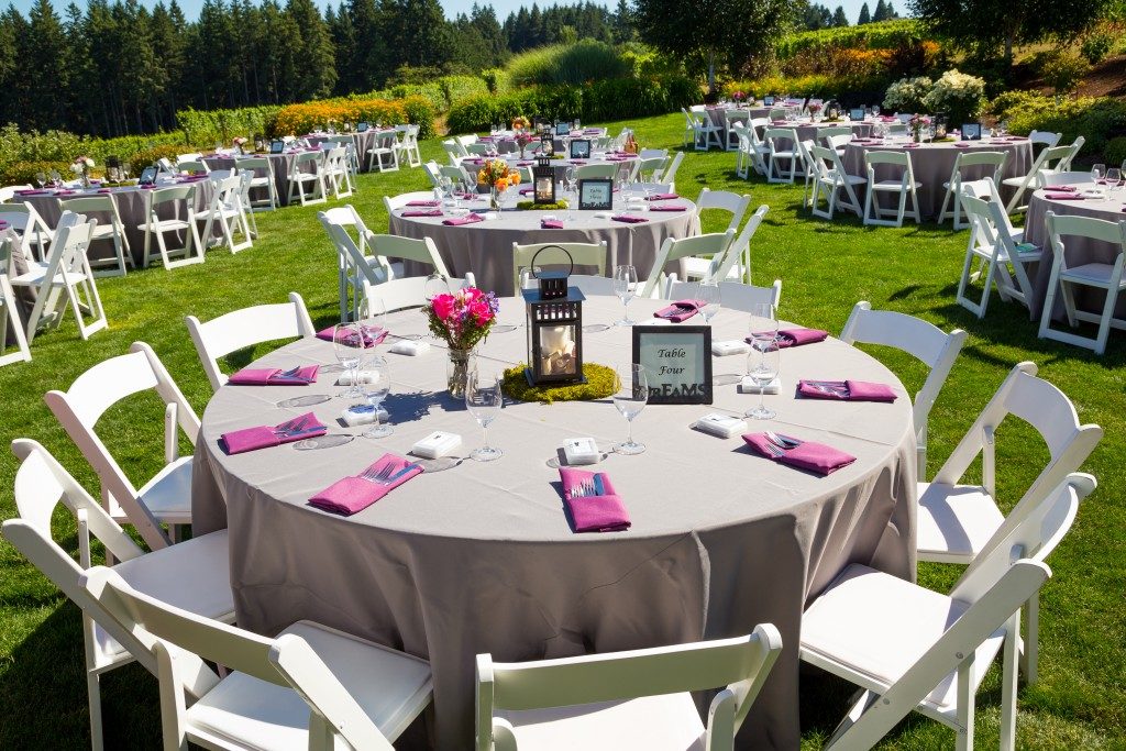 Tables, chairs, decor, and decorations at a wedding reception