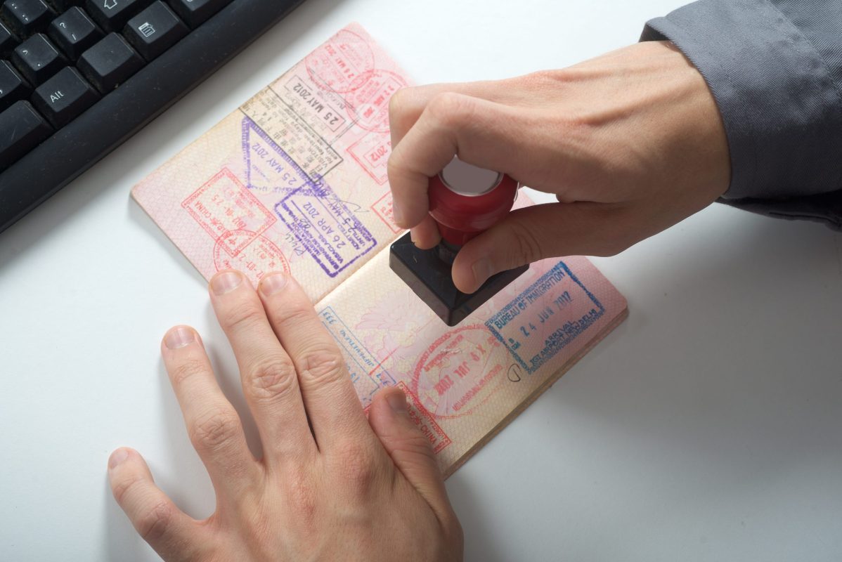 Passport being stamped